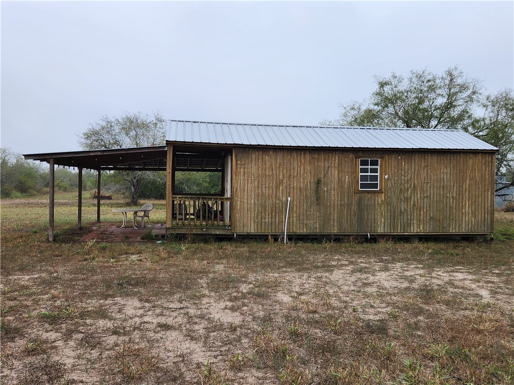 1888 County Road 440 Alice, TX 78332 - Photo 4 of 32 a view of a backyard