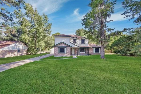 $2,095 | 10071 Woodhollow Drive, Conroe, TX 77385