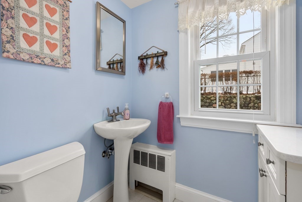 17 Wetherbee Road Waltham, MA 02453 - Photo 8 of 19 a bathroom with a sink and a mirror