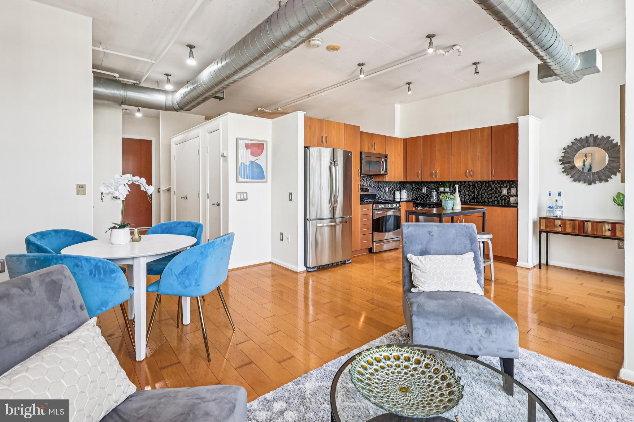 811 4th Street Northwest, Unit 1014 Washington, DC 20001 - Photo 7 of 21 a view of a dining room with furniture