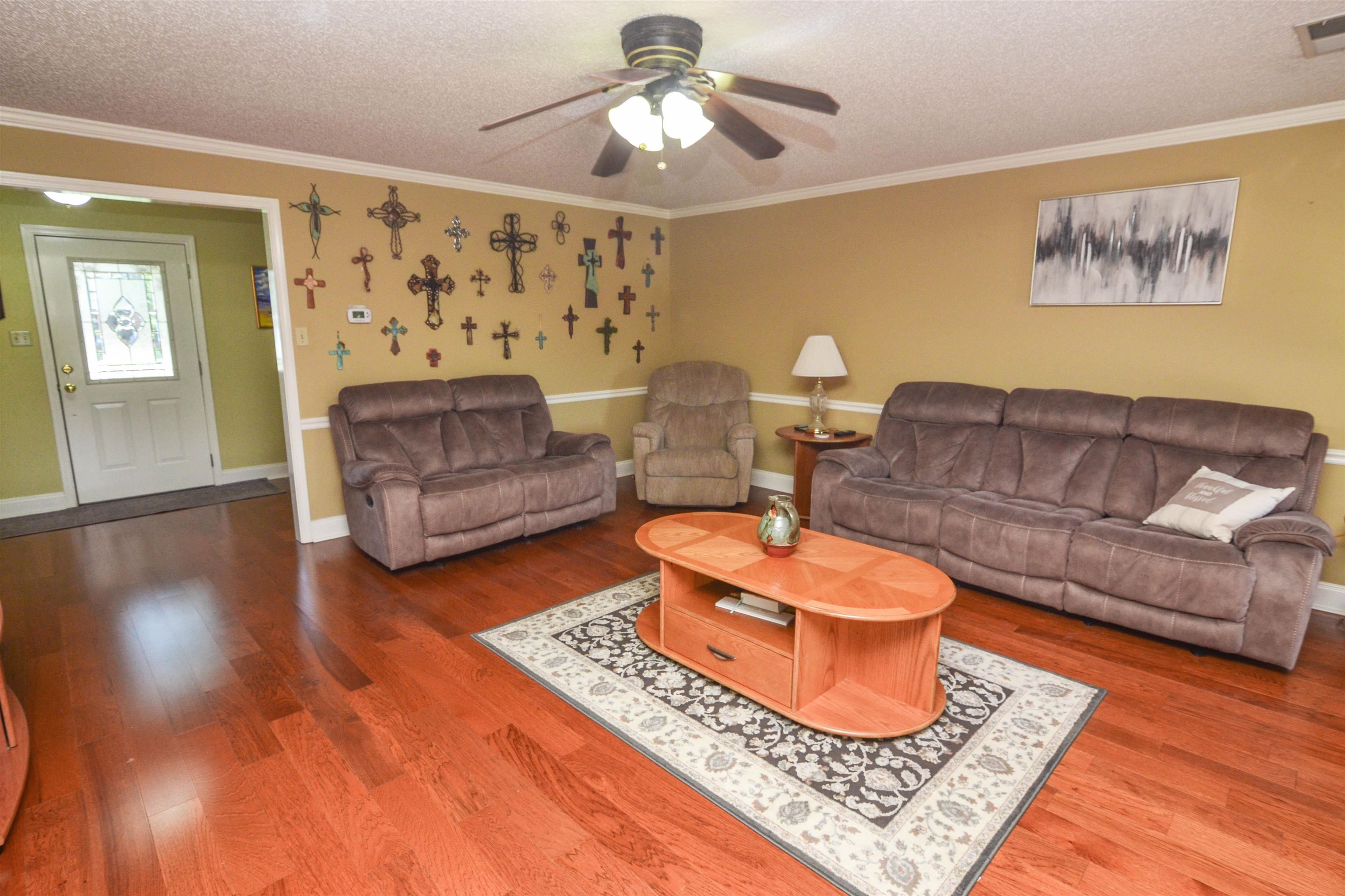 591 Rillbrook Drive Collierville, TN 38017 - Photo 5 of 25 a living room with furniture and a rug