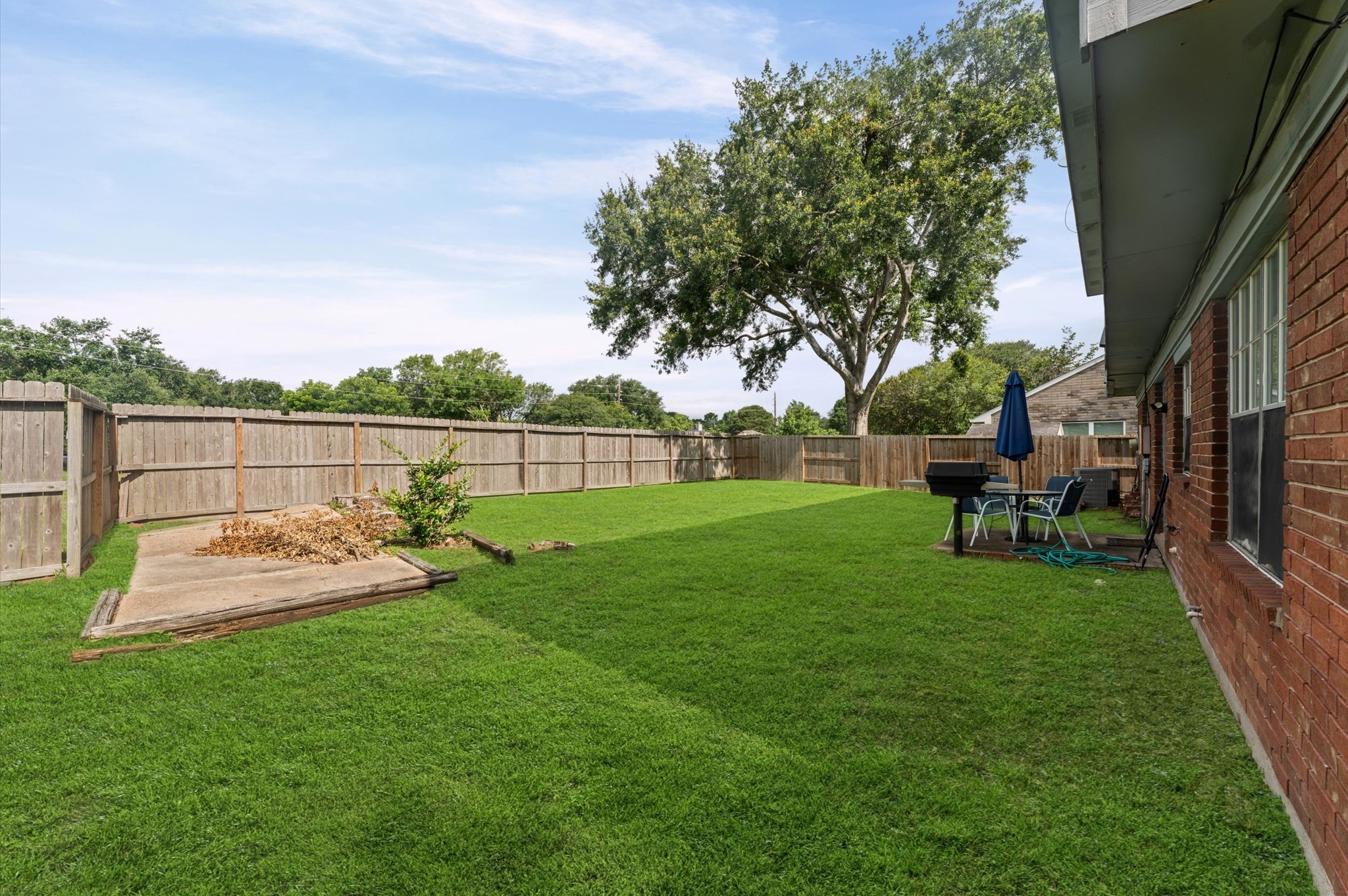 9903 Burntfork Street Houston, TX 77064 - Photo 22 of 25 Gas grill tied in to the home gas line so you'll never have to buy propane tanks again!