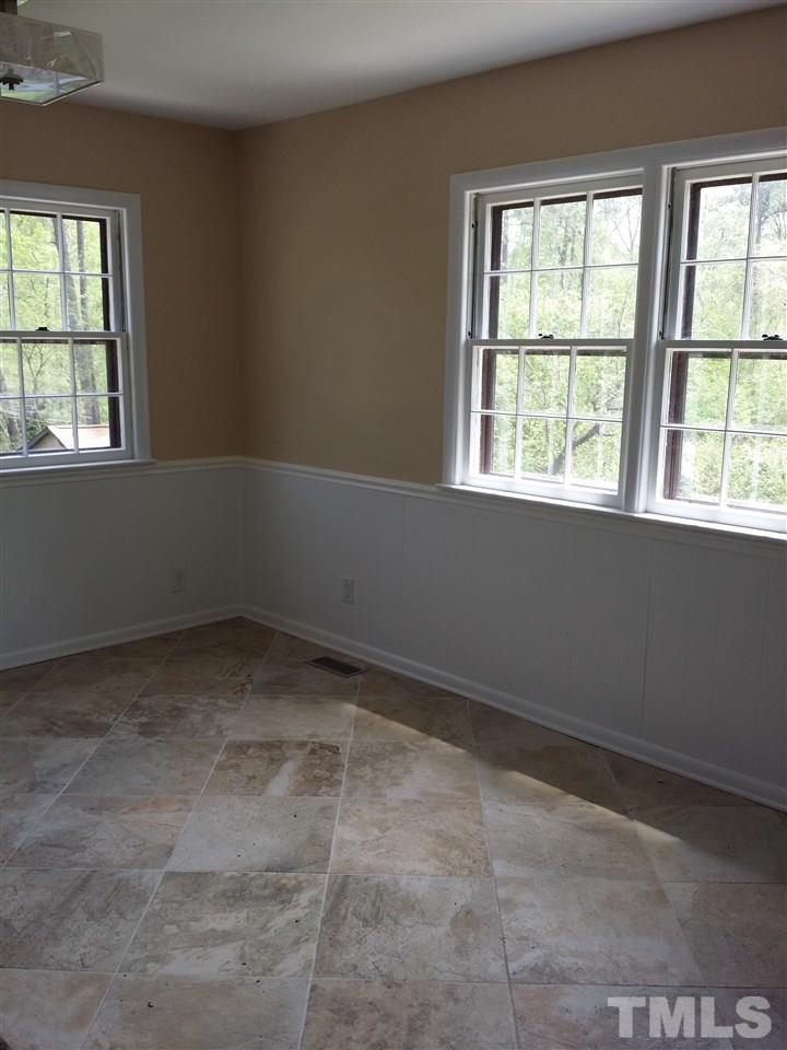 1114 North King Charles Road Raleigh, NC 27610 - Photo 3 of 13 an empty room with a window