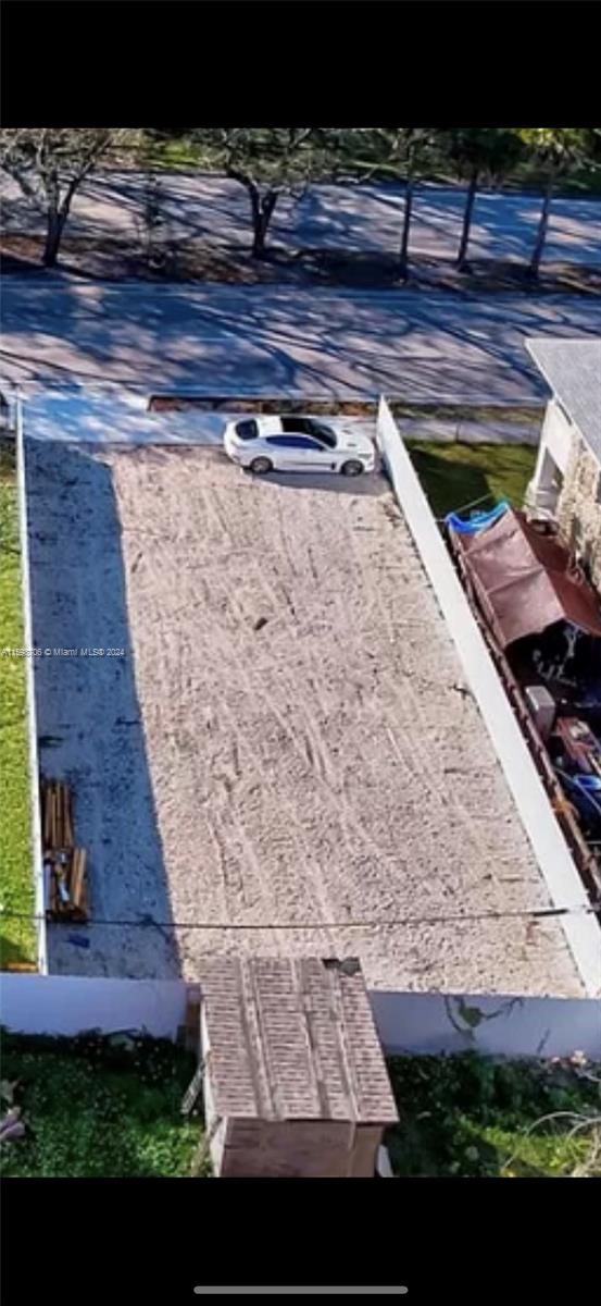 1861 Northwest 62nd Street Miami, FL 33147 - Photo 2 of 6 a view of backyard with wooden floor