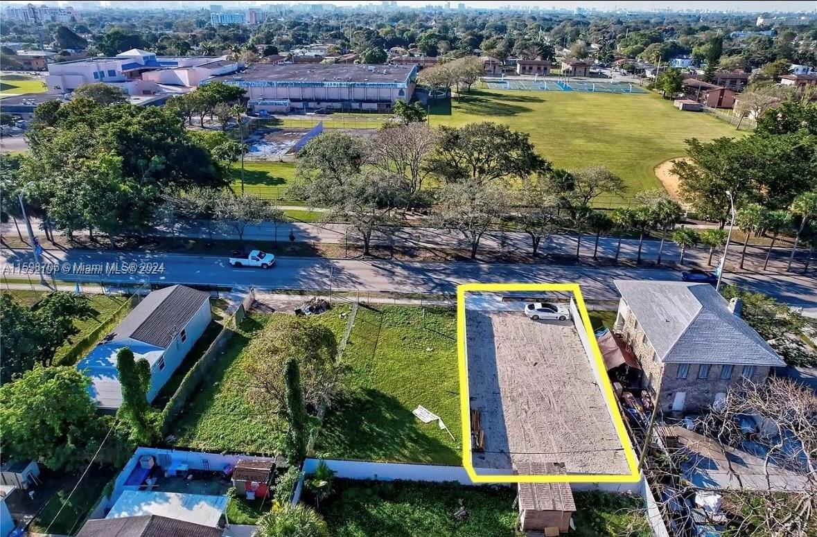 1861 Northwest 62nd Street Miami, FL 33147 - Photo 4 of 6 an aerial view of residential houses with outdoor space and swimming pool