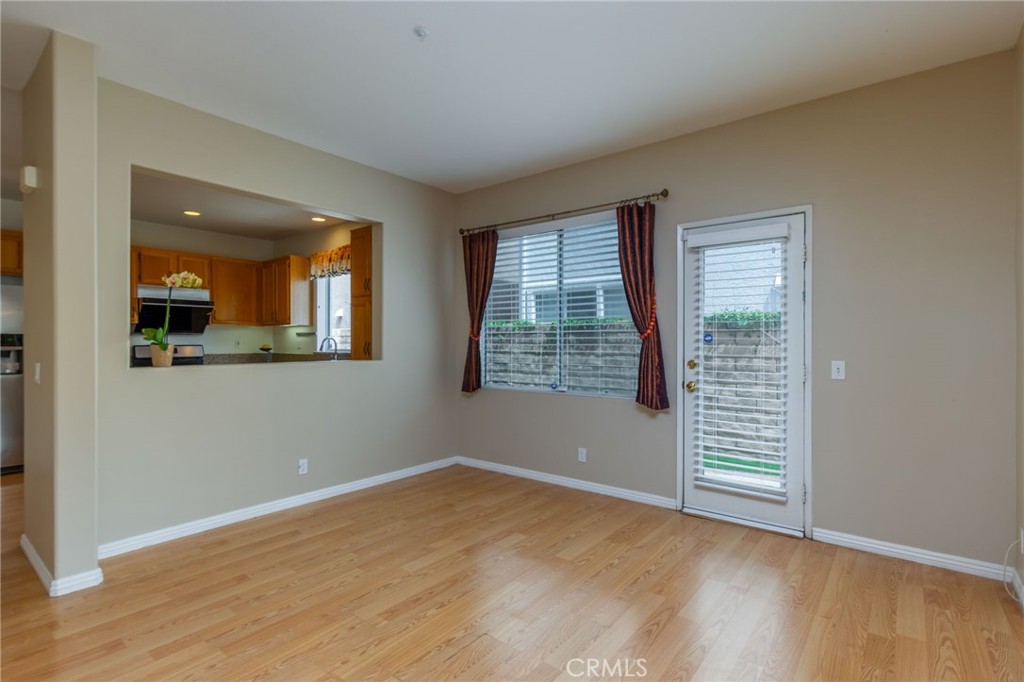 1654 Rush Haven Way Simi Valley, CA 93065 - Photo 11 of 32 a view of empty room with wooden floor and fan