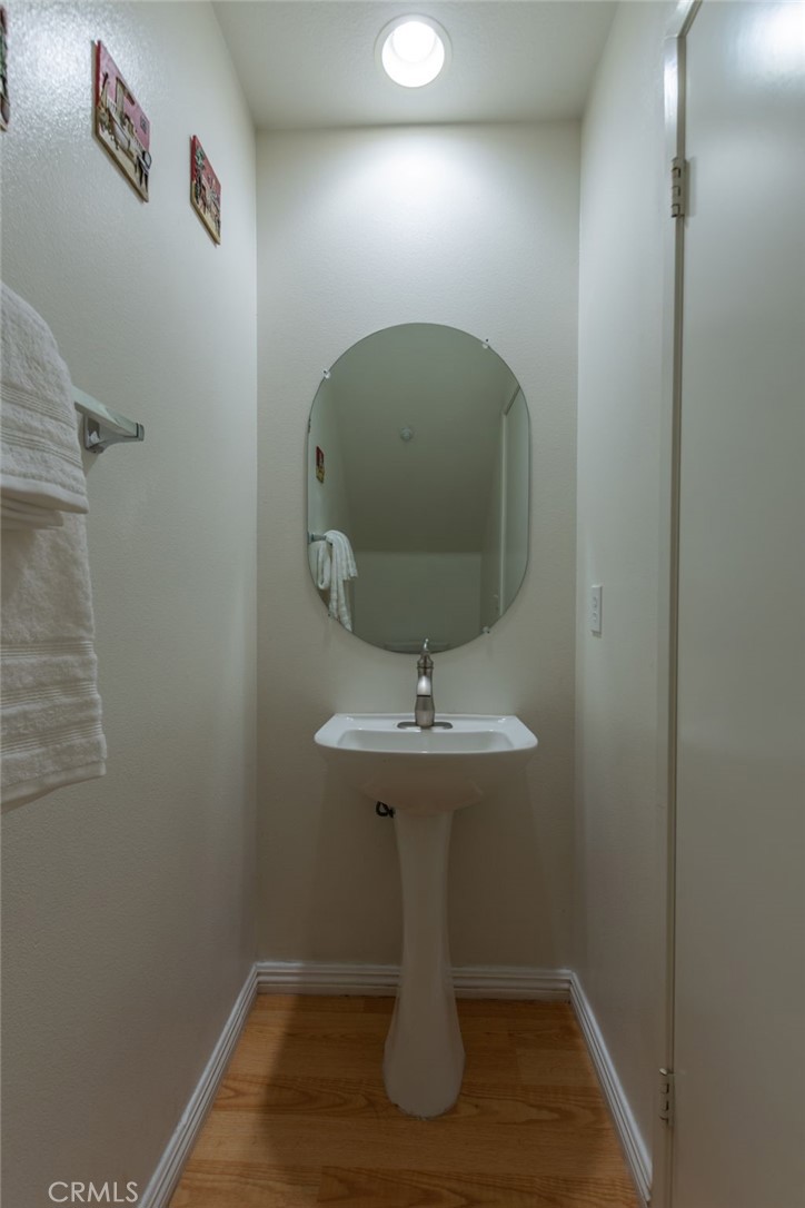 1654 Rush Haven Way Simi Valley, CA 93065 - Photo 16 of 32 a bathroom with a sink and mirror
