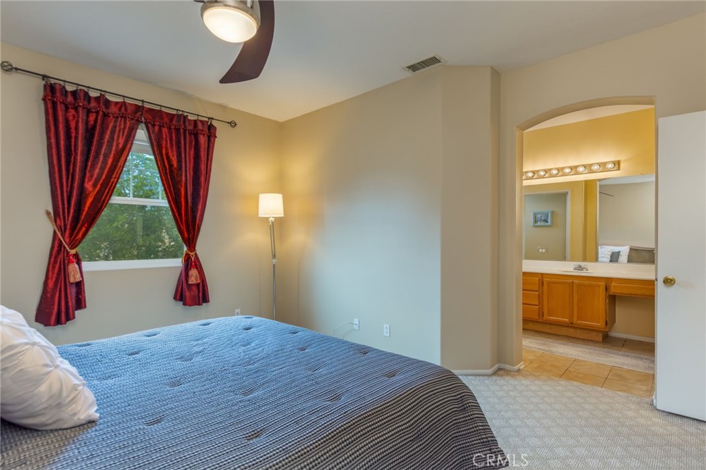 1654 Rush Haven Way Simi Valley, CA 93065 - Photo 19 of 32 a bedroom with a bed and a dresser