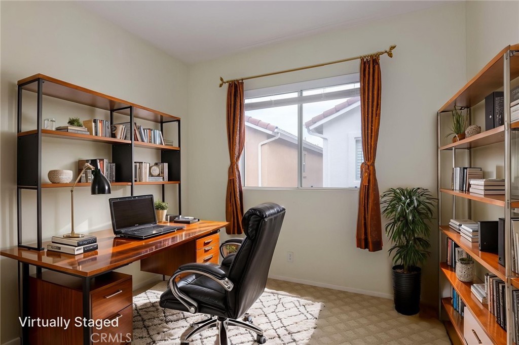 1654 Rush Haven Way Simi Valley, CA 93065 - Photo 21 of 32 a room with furniture and a bookshelf