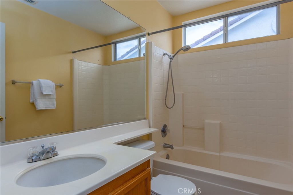 1654 Rush Haven Way Simi Valley, CA 93065 - Photo 24 of 32 a bathroom with a sink a toilet and shower