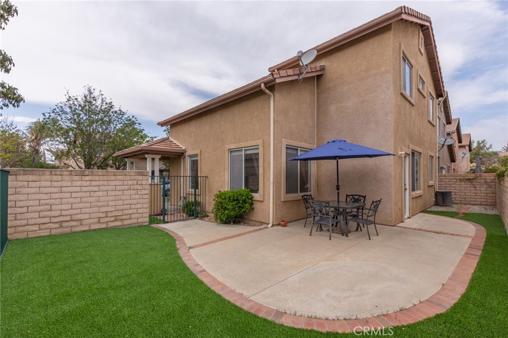 1654 Rush Haven Way Simi Valley, CA 93065 - Photo 26 of 32 a view of a house with backyard porch and sitting area