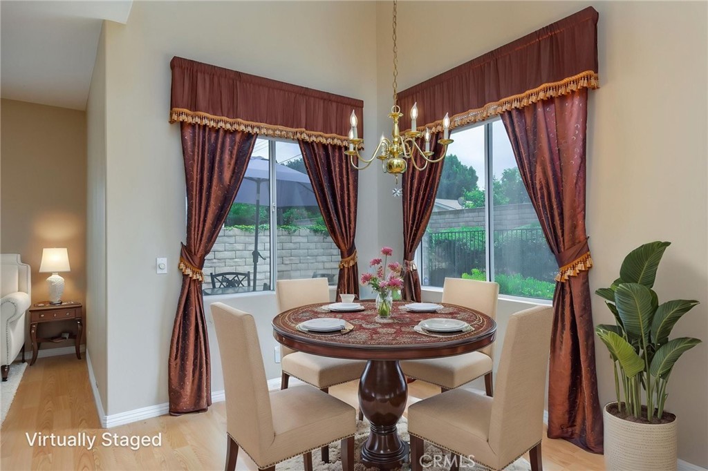 1654 Rush Haven Way Simi Valley, CA 93065 - Photo 8 of 32 a view of a dining room with furniture window and outside view