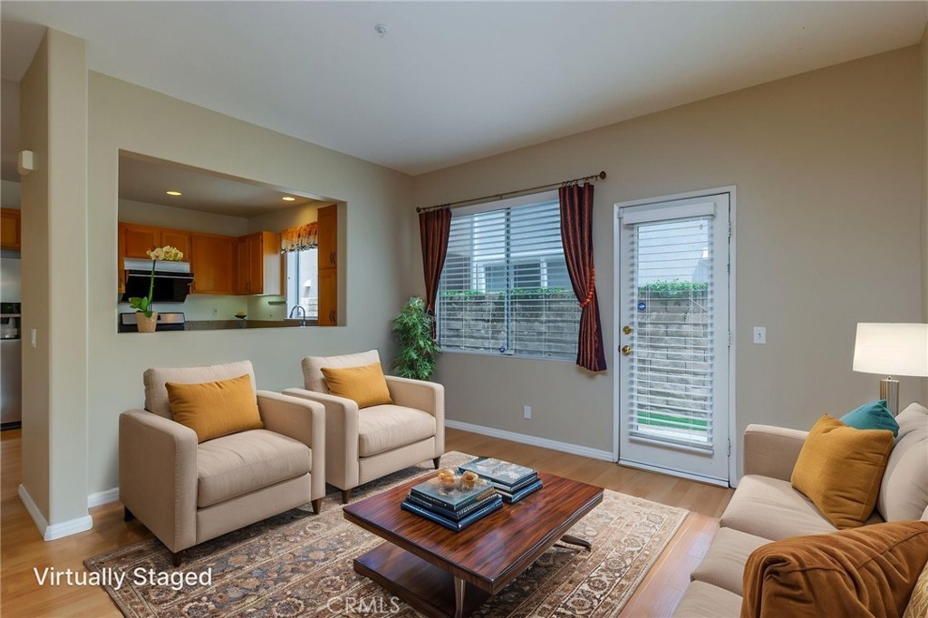 1654 Rush Haven Way Simi Valley, CA 93065 - Photo 10 of 32 a living room with furniture and a window