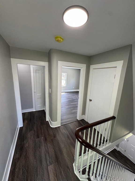 32 Main Street Monson, MA 01057 - Photo 27 of 42 a view of an empty room with wooden floor and a window