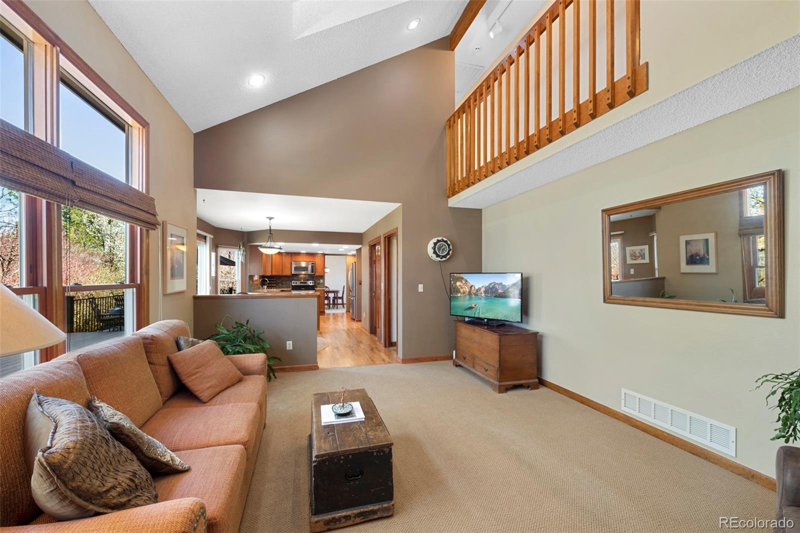 7975 Sweet Water Road Lone Tree, CO 80124 - Photo 17 of 43 a living room with furniture and a window