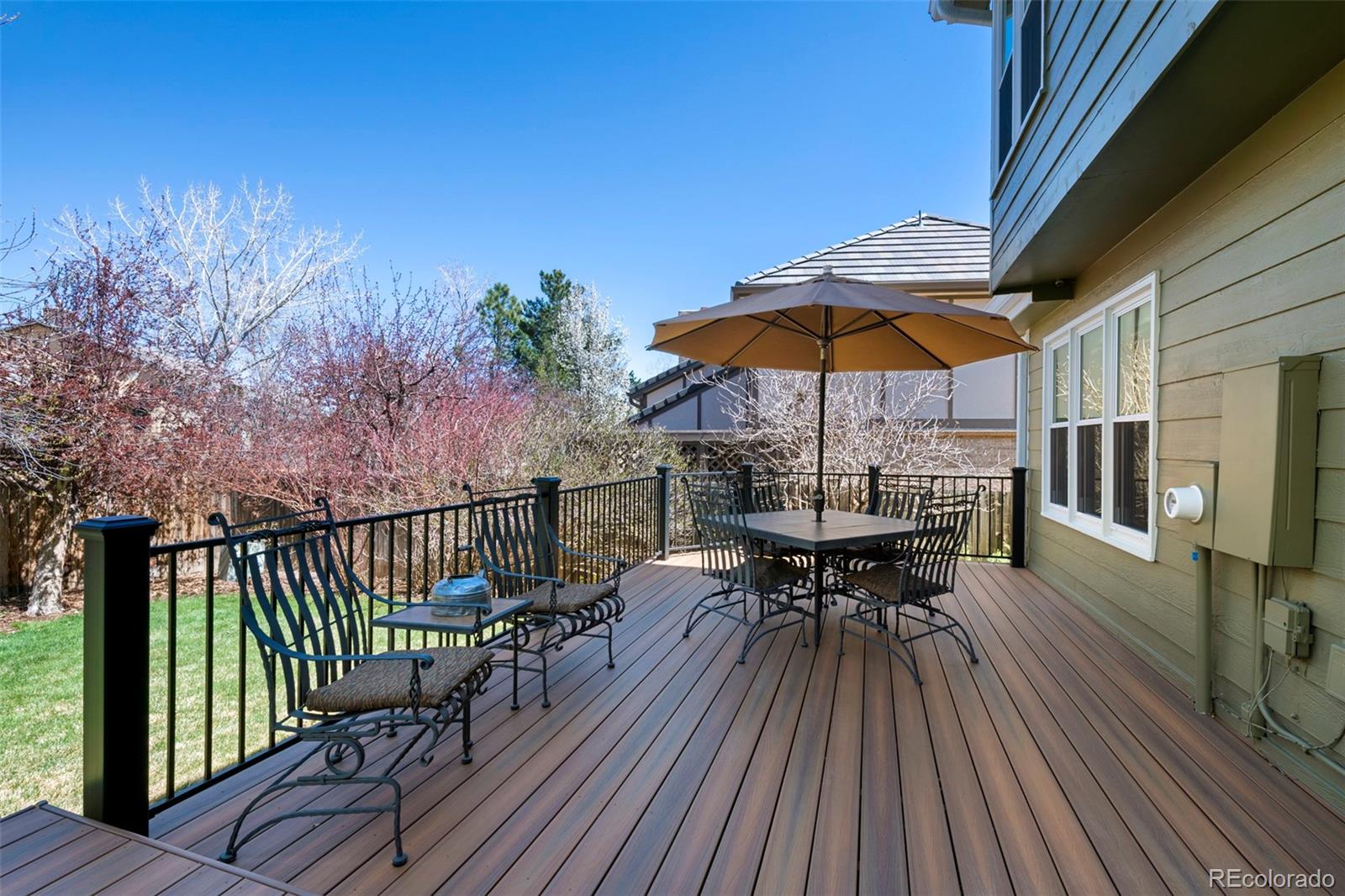 7975 Sweet Water Road Lone Tree, CO 80124 - Photo 20 of 43 a view of balcony with furniture and wooden floor