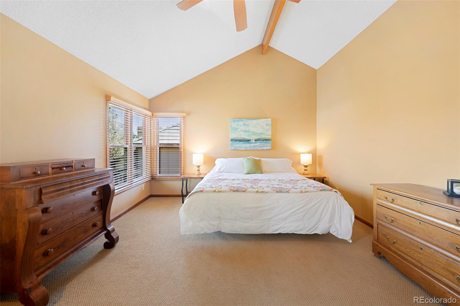 7975 Sweet Water Road Lone Tree, CO 80124 - Photo 25 of 43 a bedroom with a bed and a cabinets