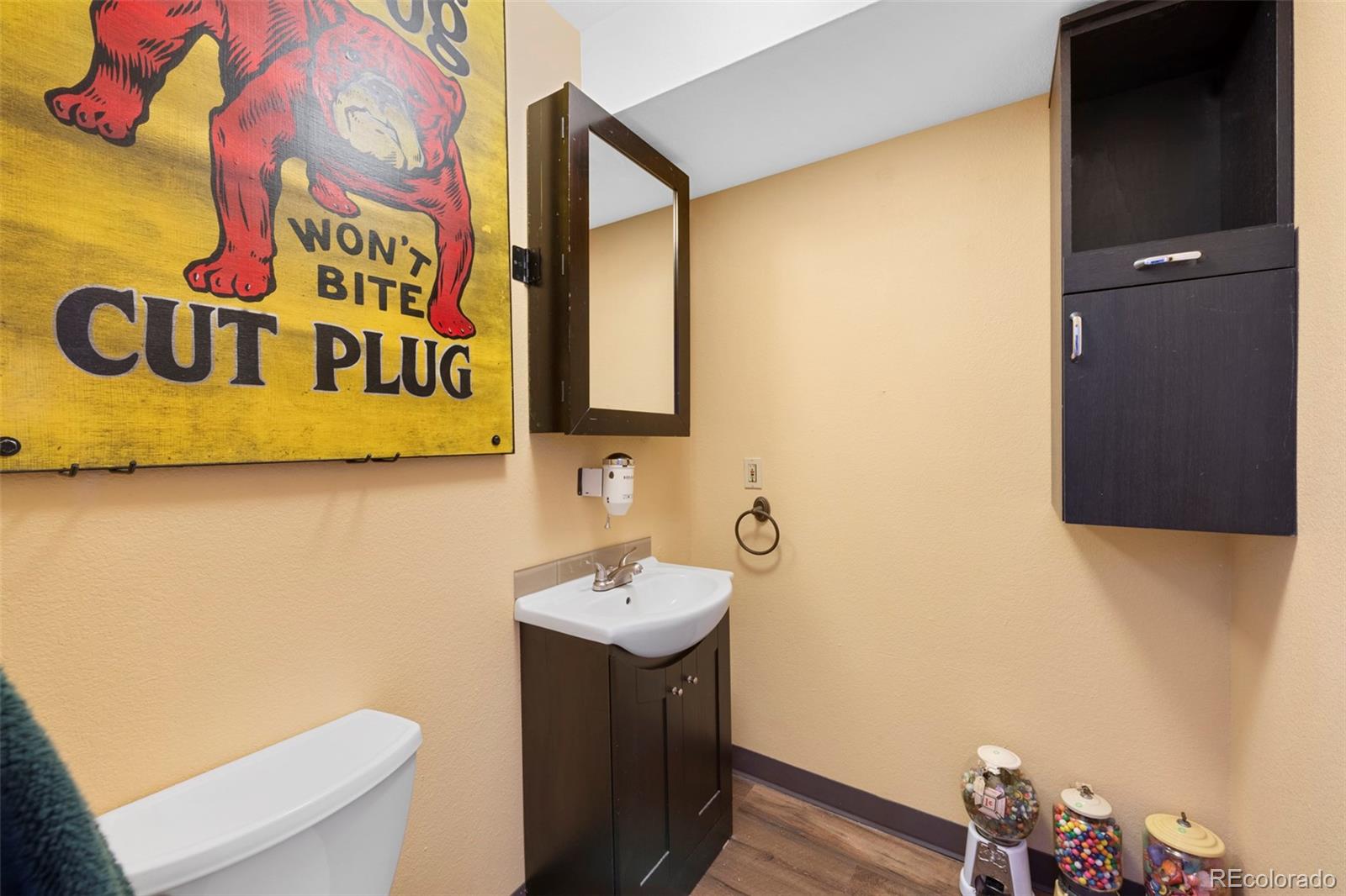 7975 Sweet Water Road Lone Tree, CO 80124 - Photo 38 of 43 a bathroom with a sink and a mirror