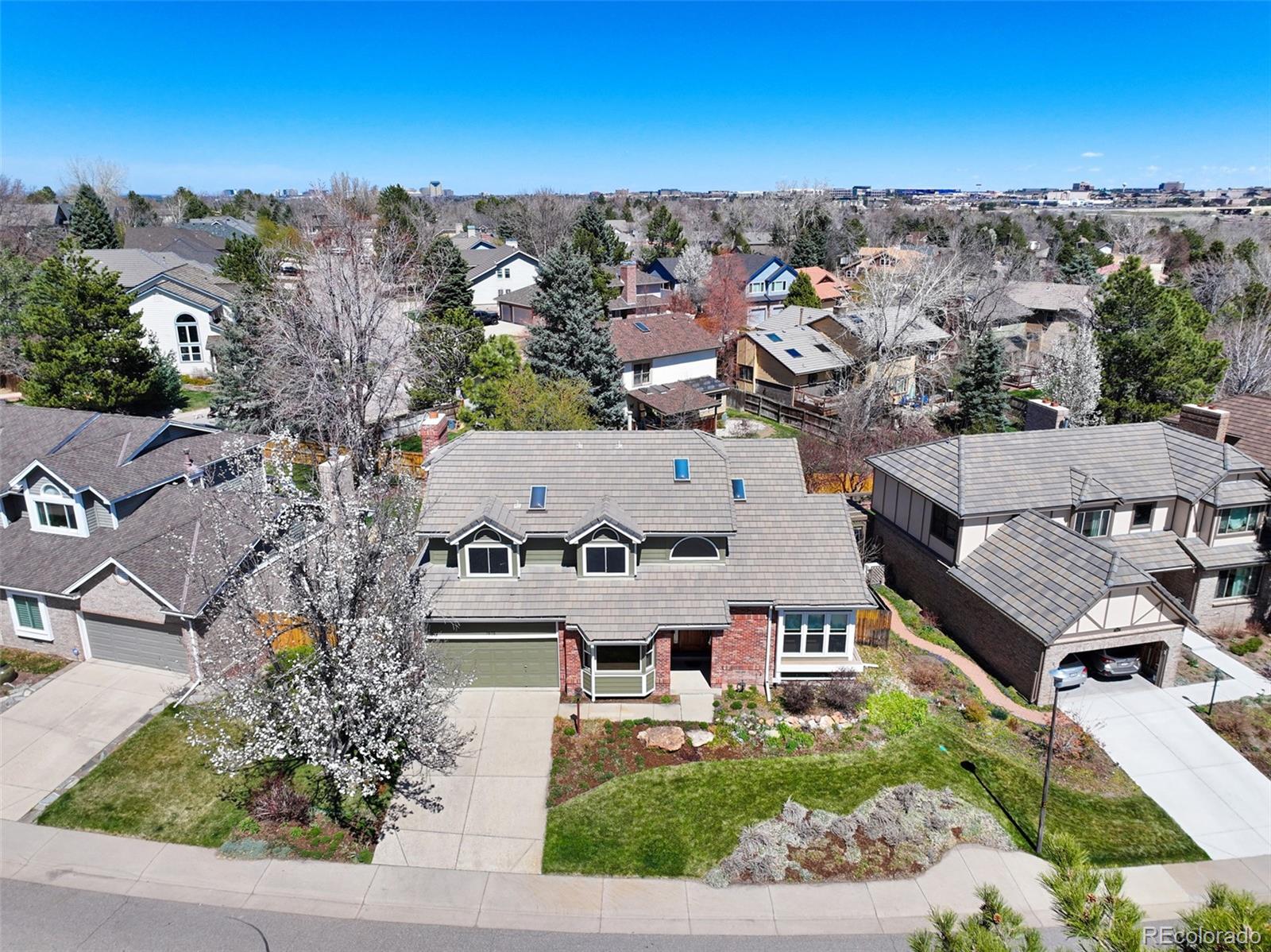 7975 Sweet Water Road Lone Tree, CO 80124 - Photo 39 of 43 an aerial view of multiple houses with yard