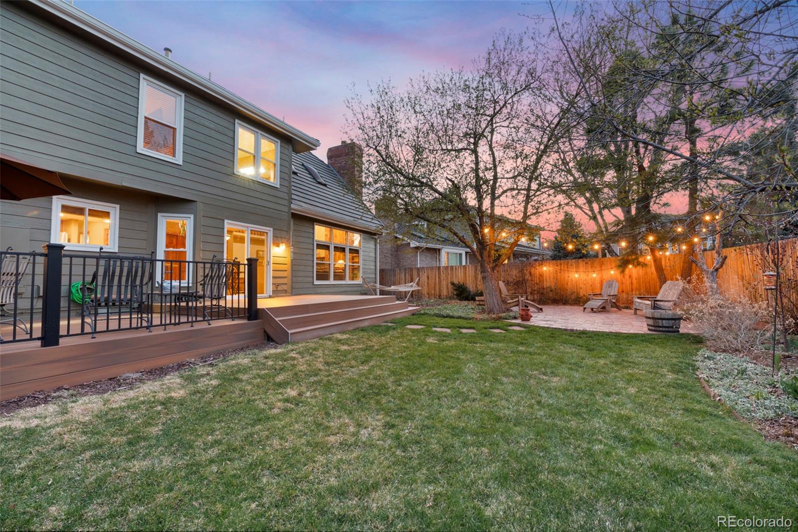 7975 Sweet Water Road Lone Tree, CO 80124 - Photo 4 of 43 a house view with a garden space