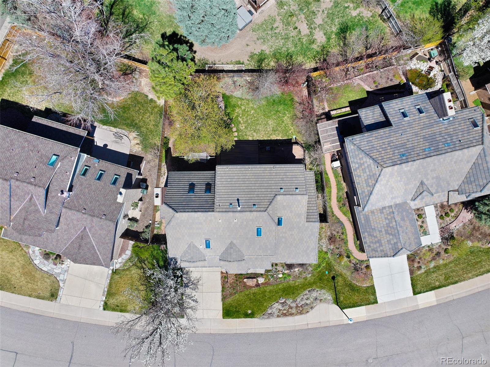 7975 Sweet Water Road Lone Tree, CO 80124 - Photo 43 of 43 an aerial view of a house with a yard
