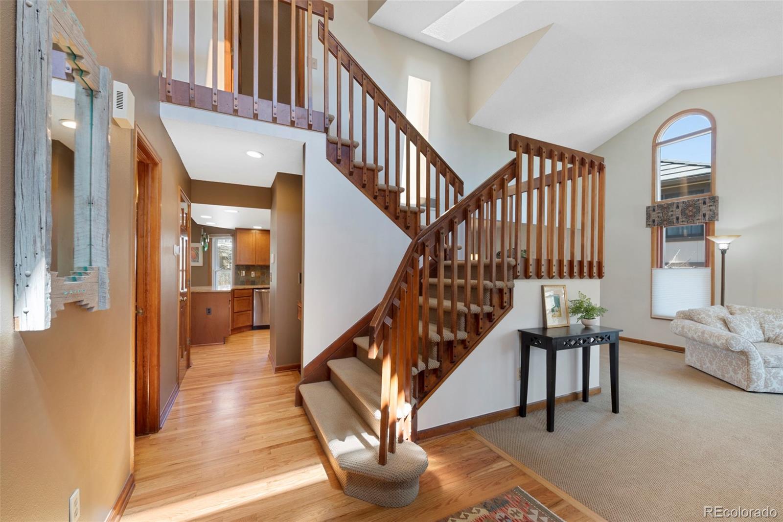 7975 Sweet Water Road Lone Tree, CO 80124 - Photo 7 of 43 a view of entryway and hall with wooden floor