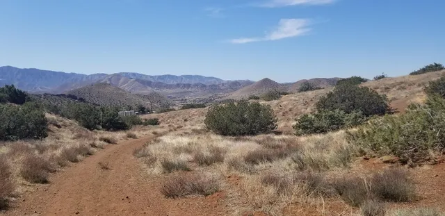 a view of a house with a mountain