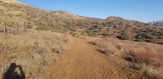 a view of mountain view with mountains in the background
