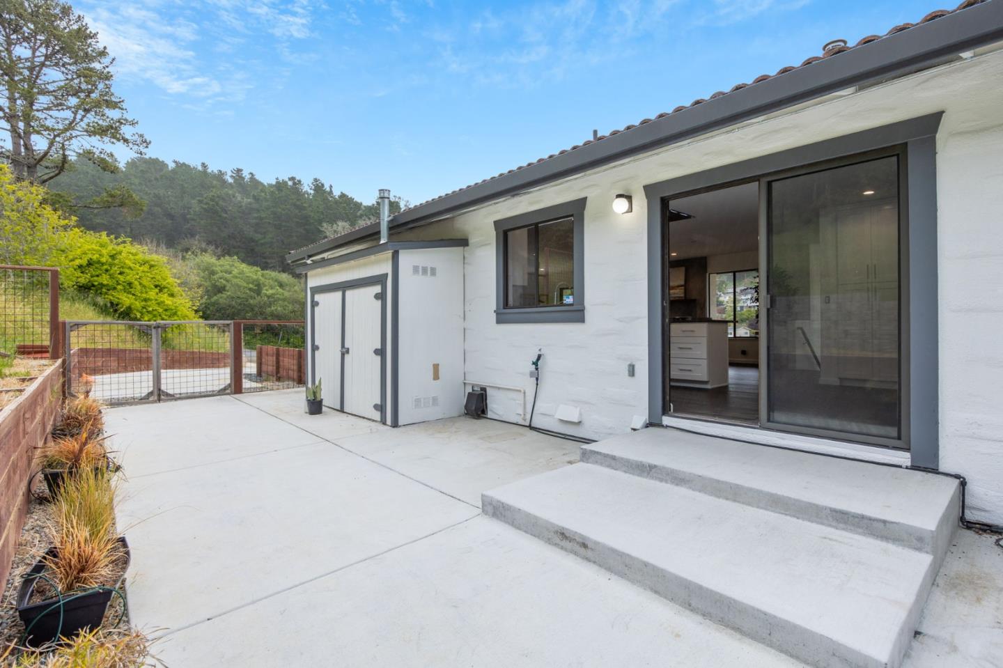 2 Hinton Ranch Road Pacifica, CA 94044 - Photo 41 of 100 a view of a house with backyard and porch