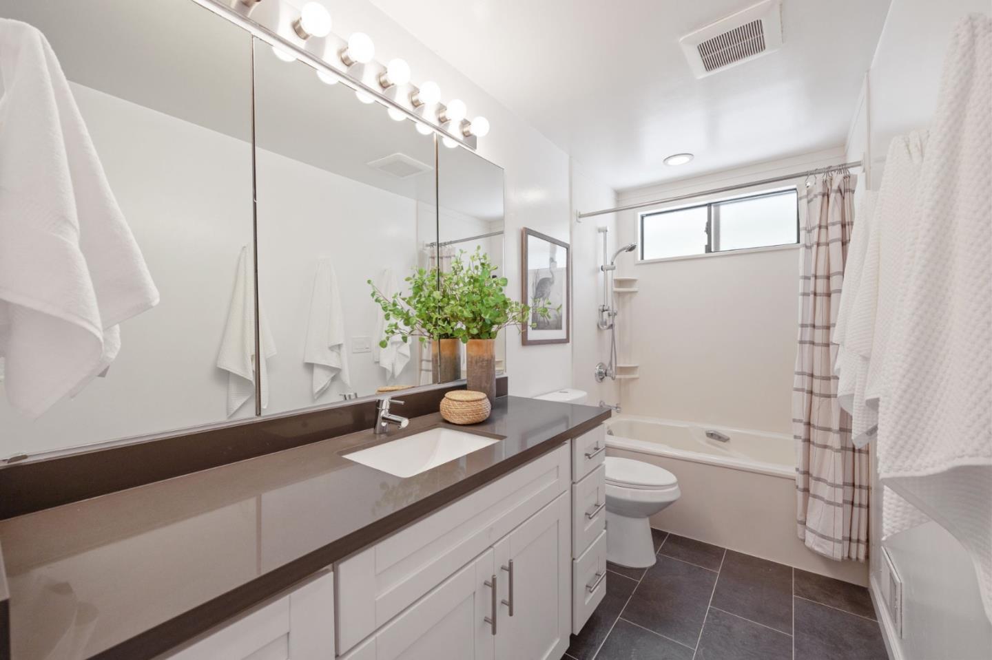 2 Hinton Ranch Road Pacifica, CA 94044 - Photo 67 of 100 a bathroom with a sink a toilet and shower