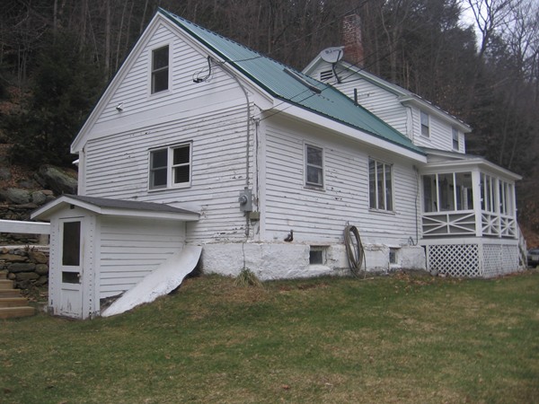 140 River Road Monroe, MA 01350 - Photo 3 of 30 a front view of a house with a yard