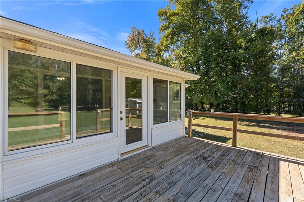 9225 Sahabi Road Kernersville, NC 27284 - Photo 30 of 33 Sunroom and Deck