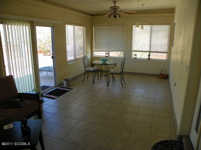 1809 Círculo Tortuga Rio Rico, AZ 85648 - Photo 12 of 26 a dining room with furniture and window