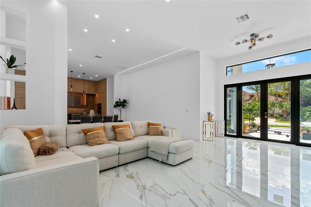 7141 Mariana Court Boca Raton, FL 33433 - Photo 11 of 68 a living room with furniture and a large window