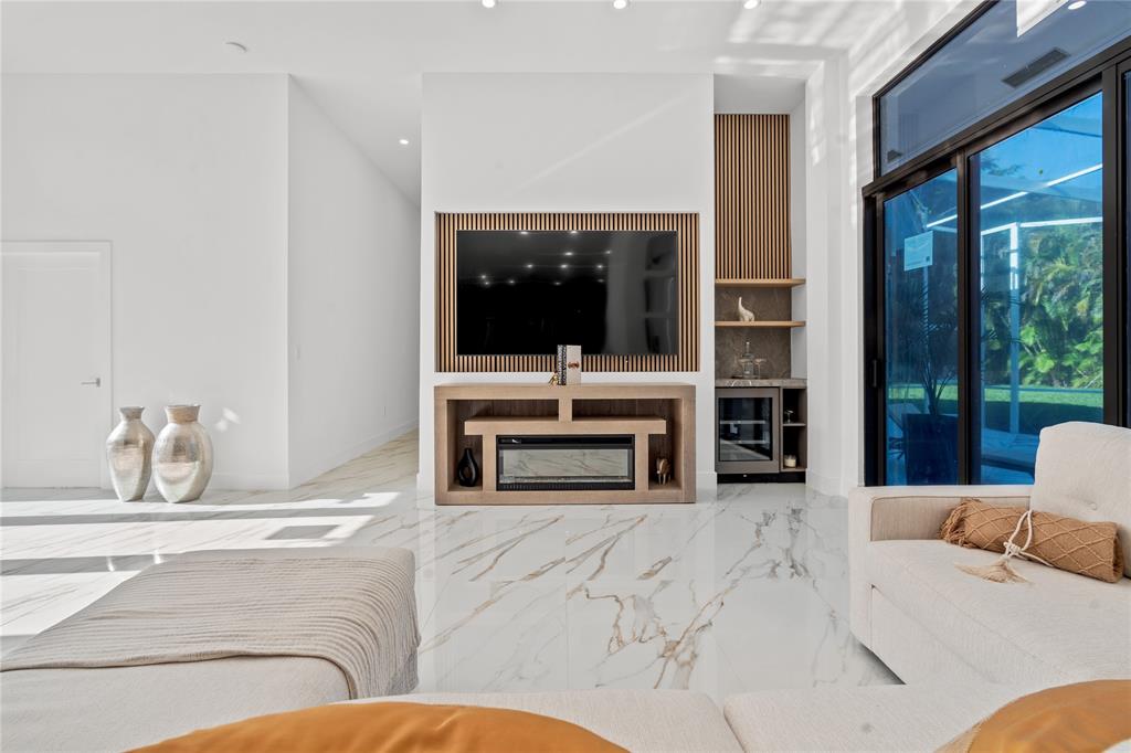 7141 Mariana Court Boca Raton, FL 33433 - Photo 15 of 68 a living room with furniture and a flat screen tv