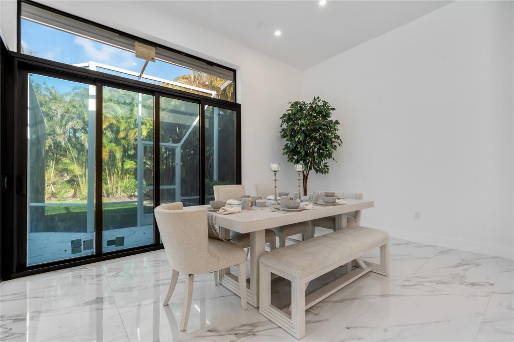 7141 Mariana Court Boca Raton, FL 33433 - Photo 30 of 68 a view of a dining room with furniture window and outside view