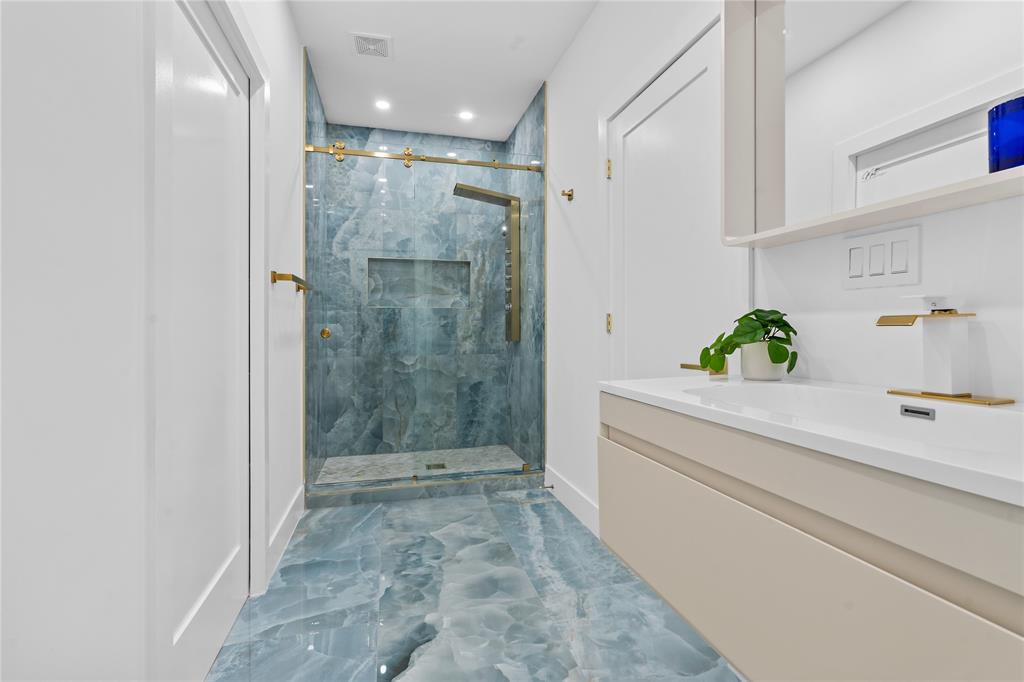 7141 Mariana Court Boca Raton, FL 33433 - Photo 52 of 68 a bathroom with a shower and a sink
