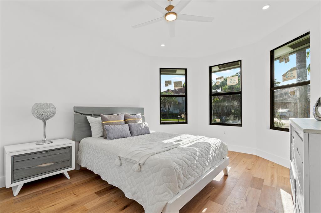 7141 Mariana Court Boca Raton, FL 33433 - Photo 53 of 68 a bedroom with bed and window