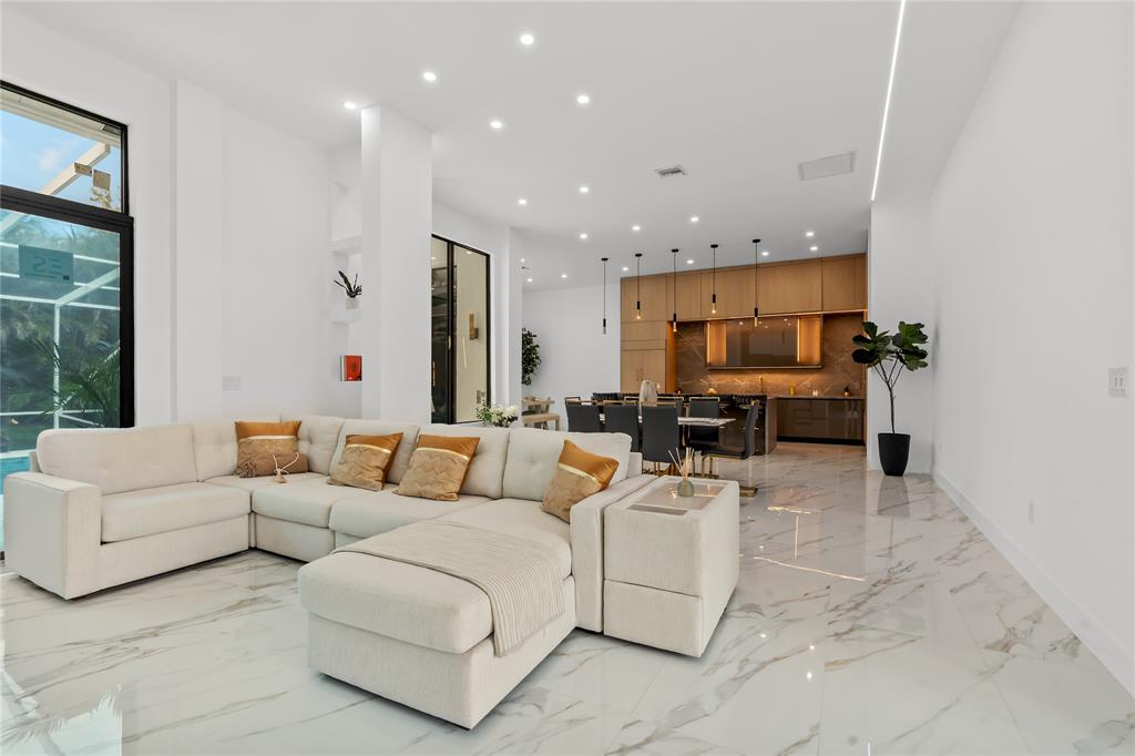 7141 Mariana Court Boca Raton, FL 33433 - Photo 10 of 68 a living room with furniture and a large window