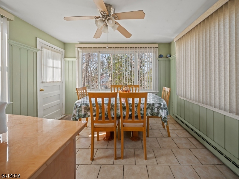 544 Goffle Hill Road Hawthorne, NJ 07506 - Photo 6 of 21 a dining room with furniture and window