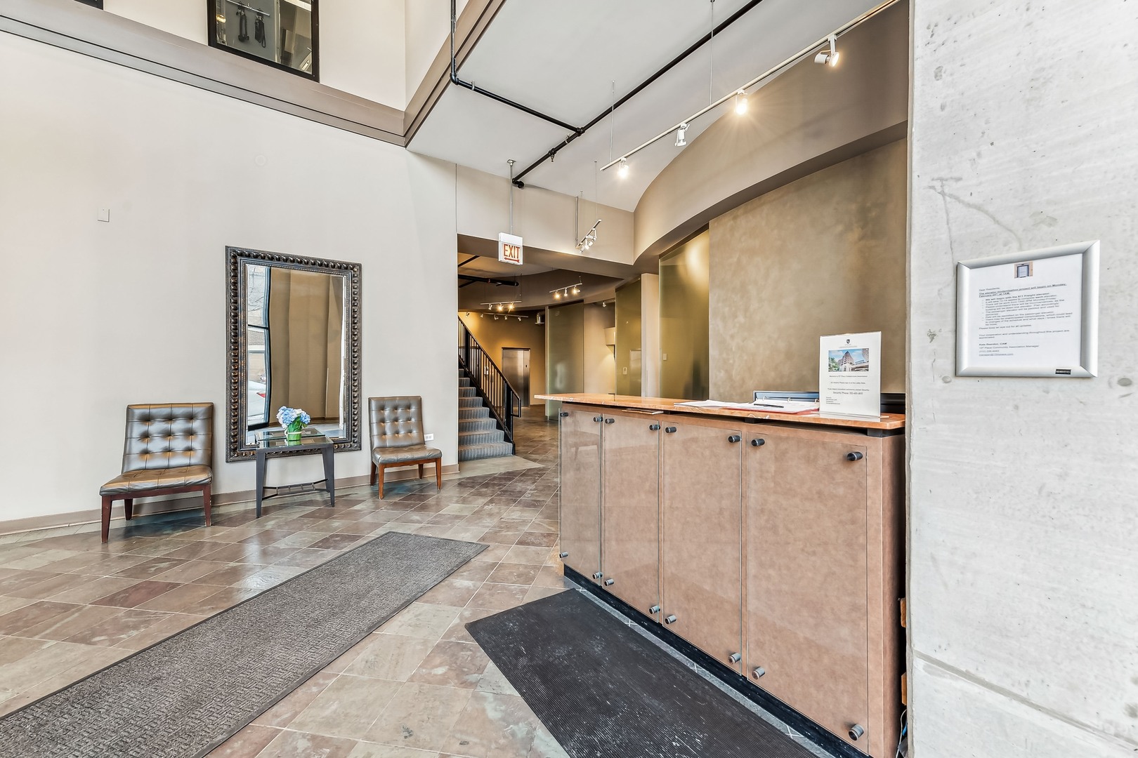 833 West 15th Place, Unit 511 Chicago, IL 60608 - Photo 14 of 16 a view of a hallway with seating area