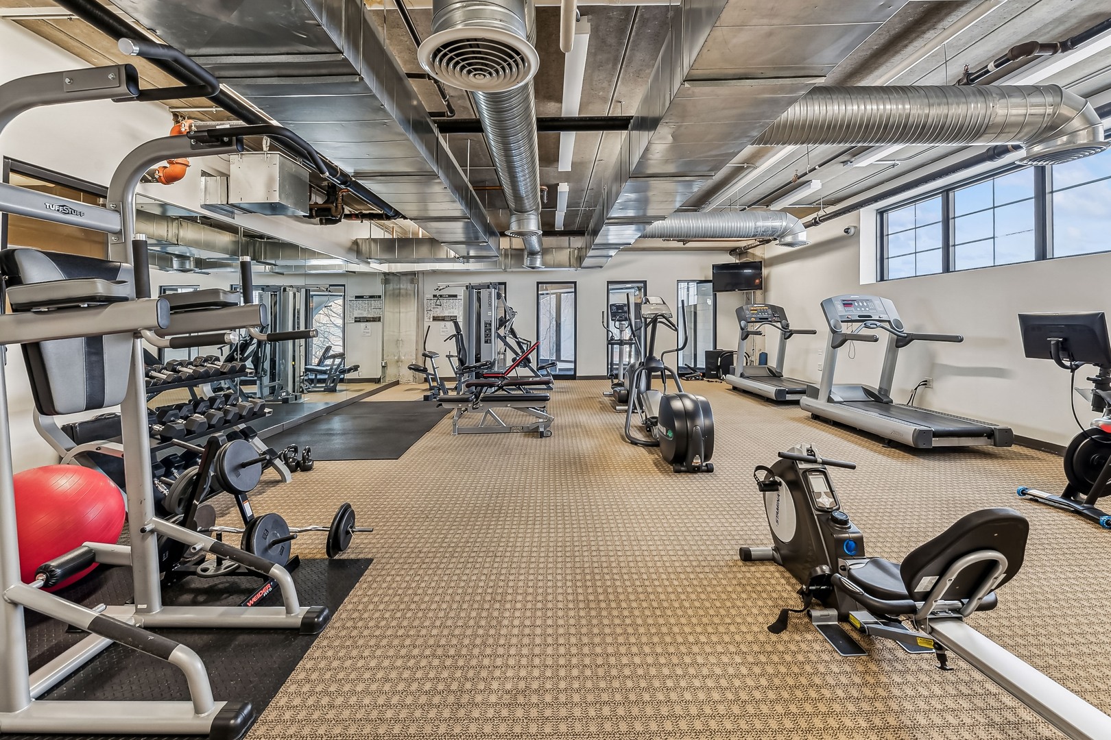 833 West 15th Place, Unit 511 Chicago, IL 60608 - Photo 15 of 16 a view of a room with gym equipment