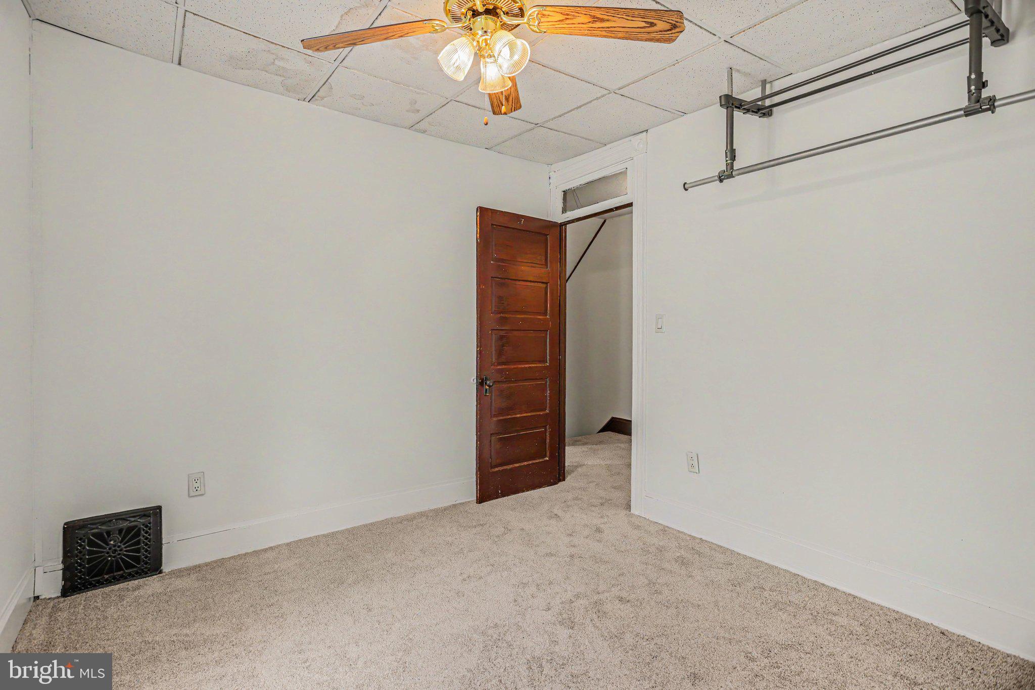 122 South Cedar Street Lititz, PA 17543 - Photo 11 of 23 a view of room with stairs and a ceiling fan