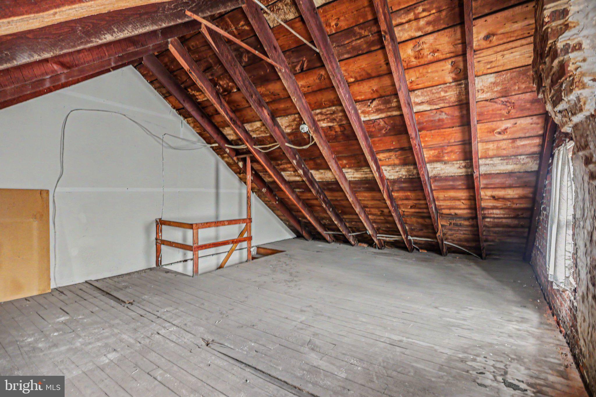 122 South Cedar Street Lititz, PA 17543 - Photo 19 of 23 a view of an empty room with a staircase