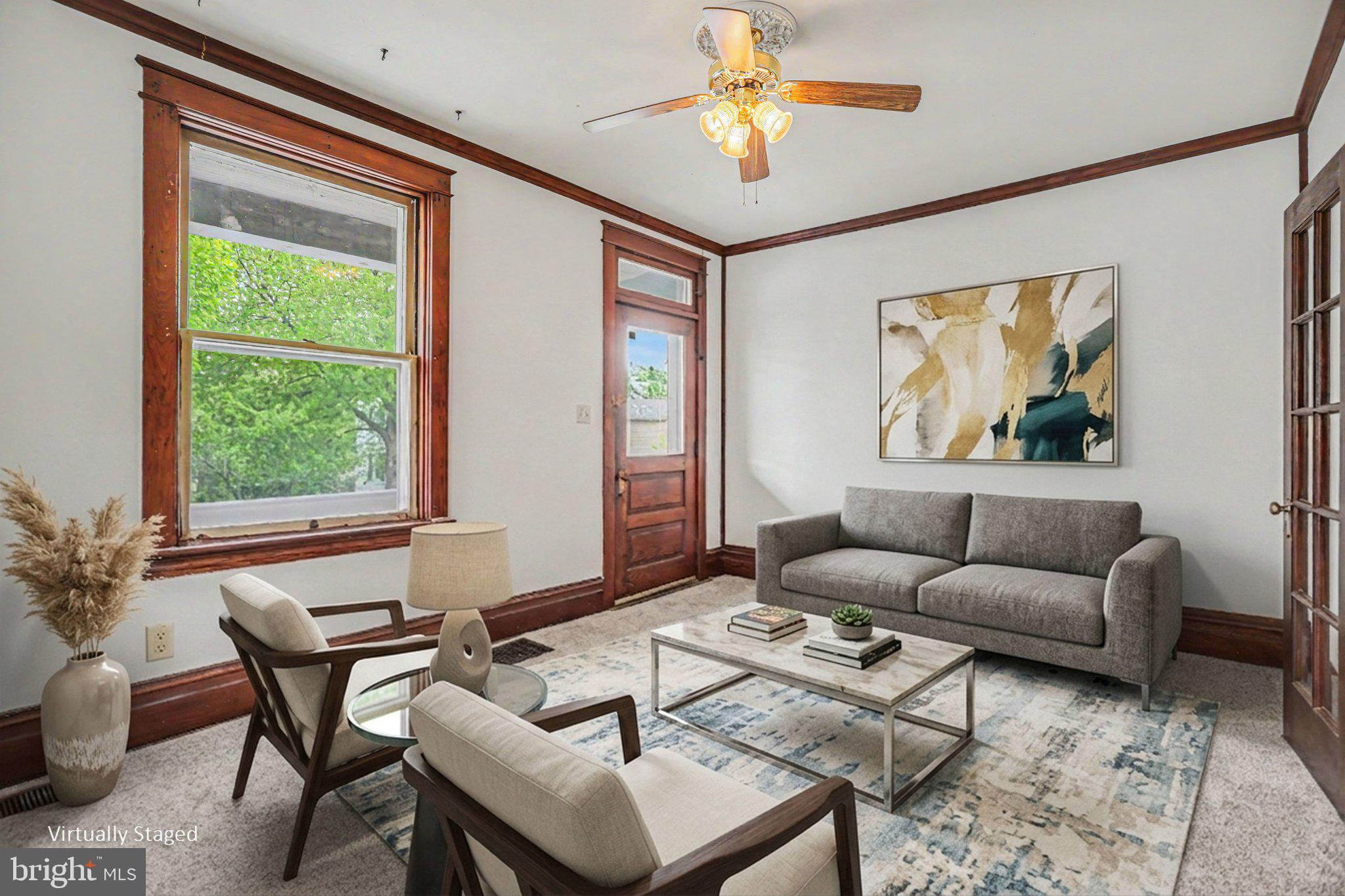 122 South Cedar Street Lititz, PA 17543 - Photo 4 of 23 a living room with furniture and a large window