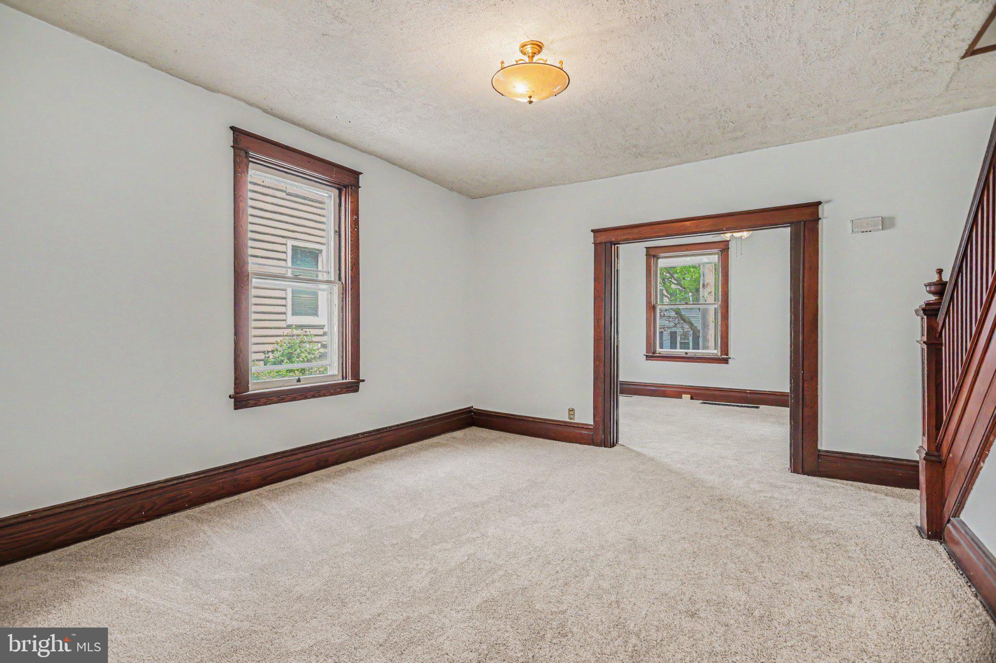 122 South Cedar Street Lititz, PA 17543 - Photo 7 of 23 an empty room with windows