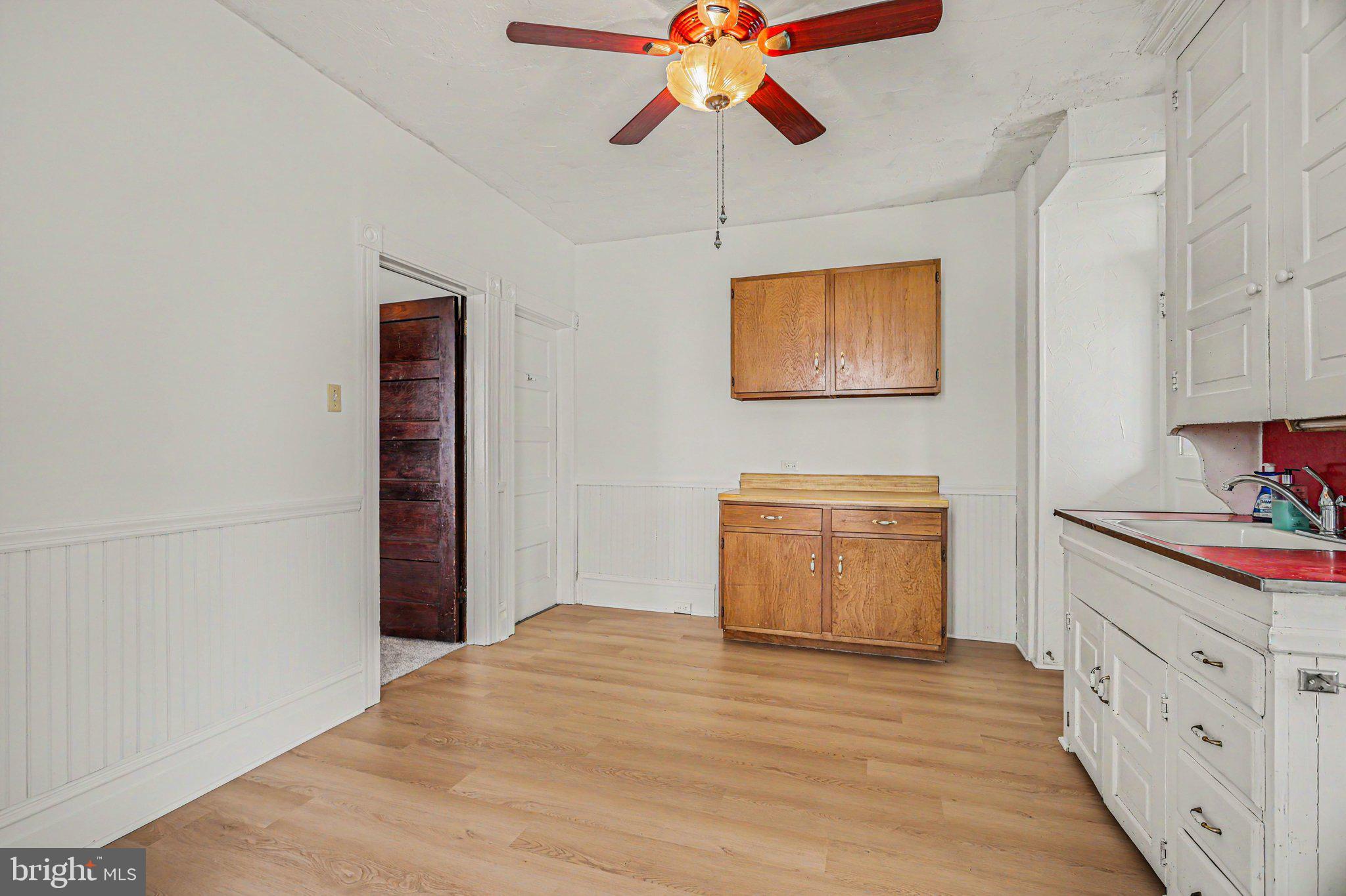 122 South Cedar Street Lititz, PA 17543 - Photo 10 of 23 a room with cabinets and wooden floor