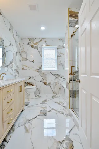 a bathroom with a sink and tub