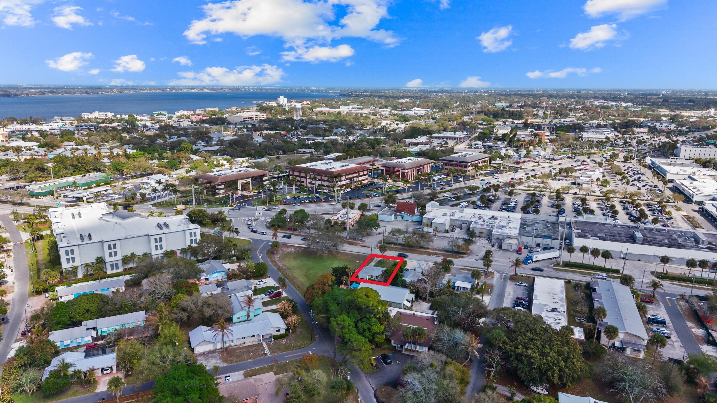 820 Southwest Palm City Road Stuart, FL 34994 - Photo 3 of 24 an aerial view of a city