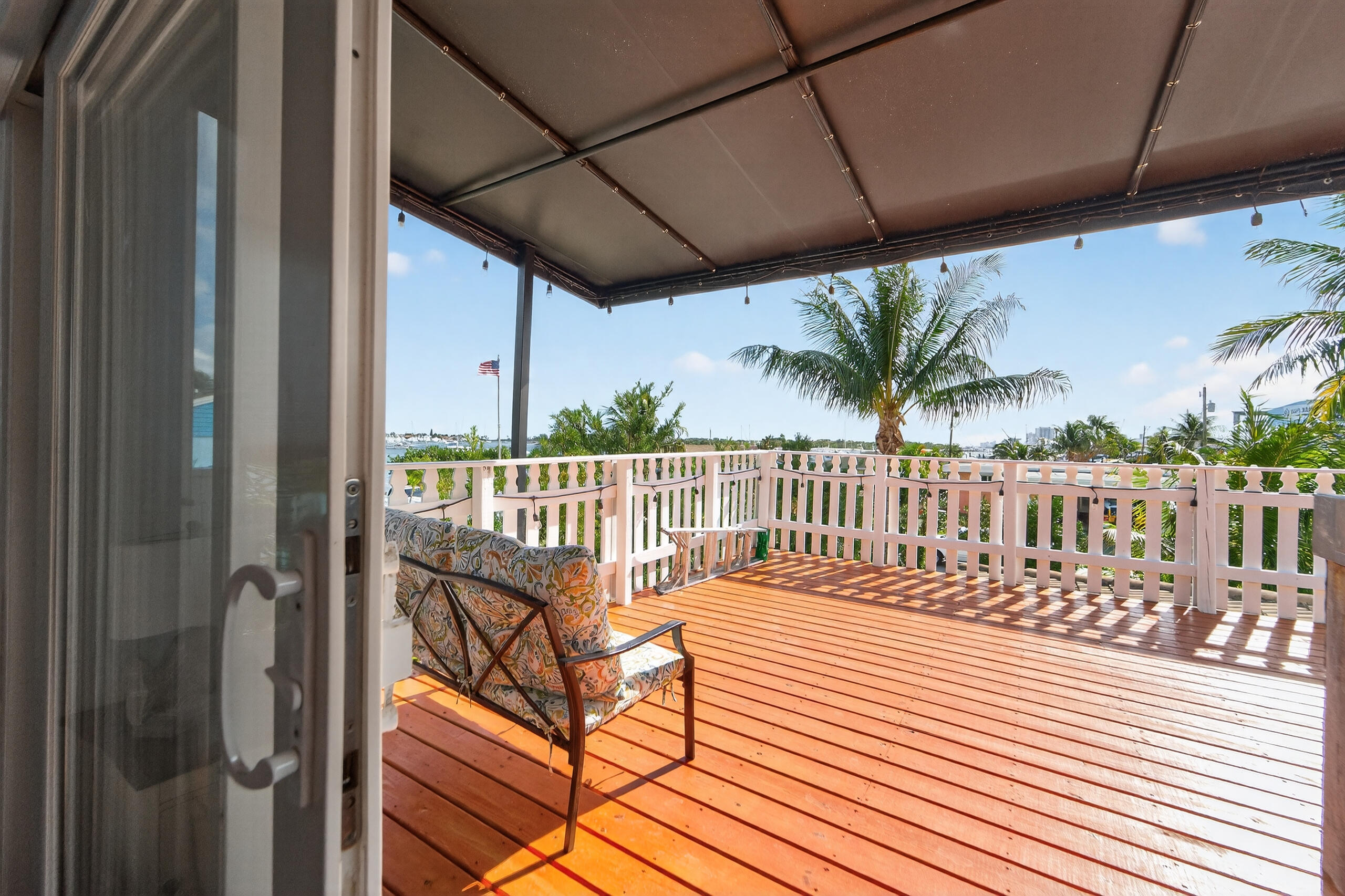 300 East 24th Street Riviera Beach, FL 33404 - Photo 13 of 19 a view of a balcony with wooden floor